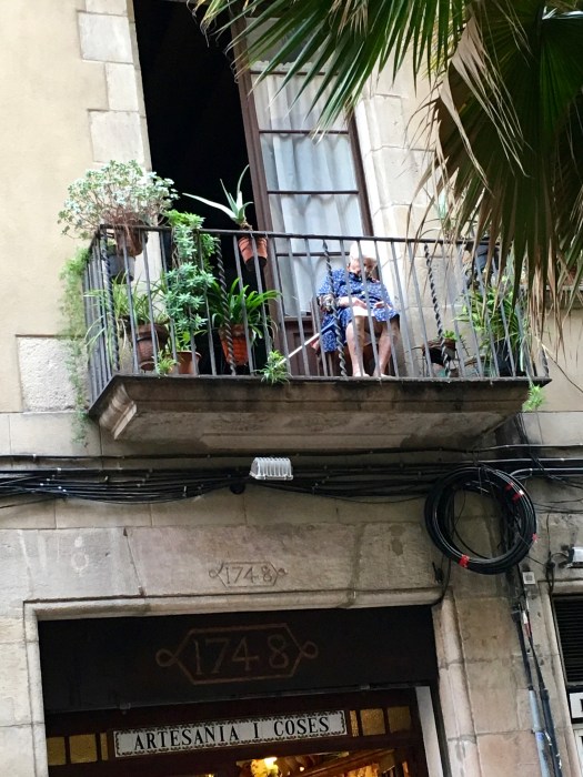While we ate tapas, this little woman watched everyone pass by from her balcony. Then she fell asleep and kept nodding to the side. I was so worried that she'd fall. 